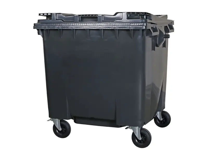 Plastic waste container 1100 liters flat lid with four wheels dark gray