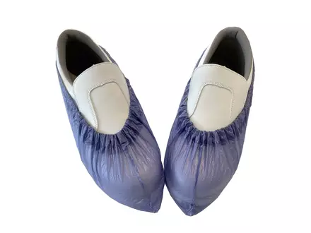 Couvre-chaussures jetable bleu 130 µm PVC 38 x 16 cm